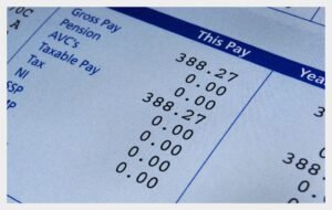 Close-up of a pay stub highlighting paycheck optimization details and earnings breakdown for better financial planning.