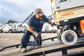 Professional truck roadside assistance technician repairing a heavy-duty truck