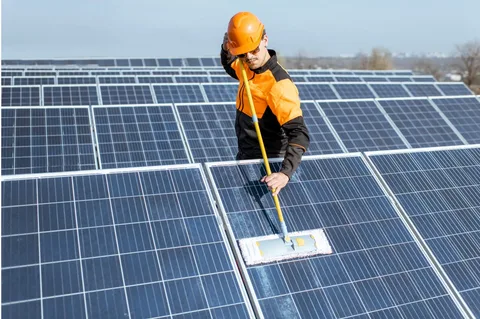 Professional solar panel cleaning services to maximize energy efficiency and remove dust from rooftop panels.