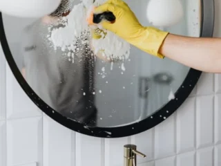 canva-faceless-person-cleaning-mirror-in-bathroom-MAD_9u9UzwY-ribqhmsh5jjo2v1il7lxmc60zjmfdnyh694ne3zva0